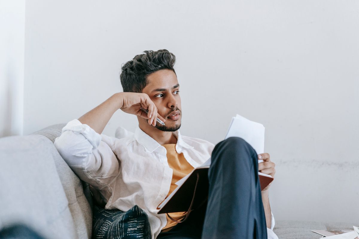 Relaxed person with a day off, representing the hands-off landlord lifestyle