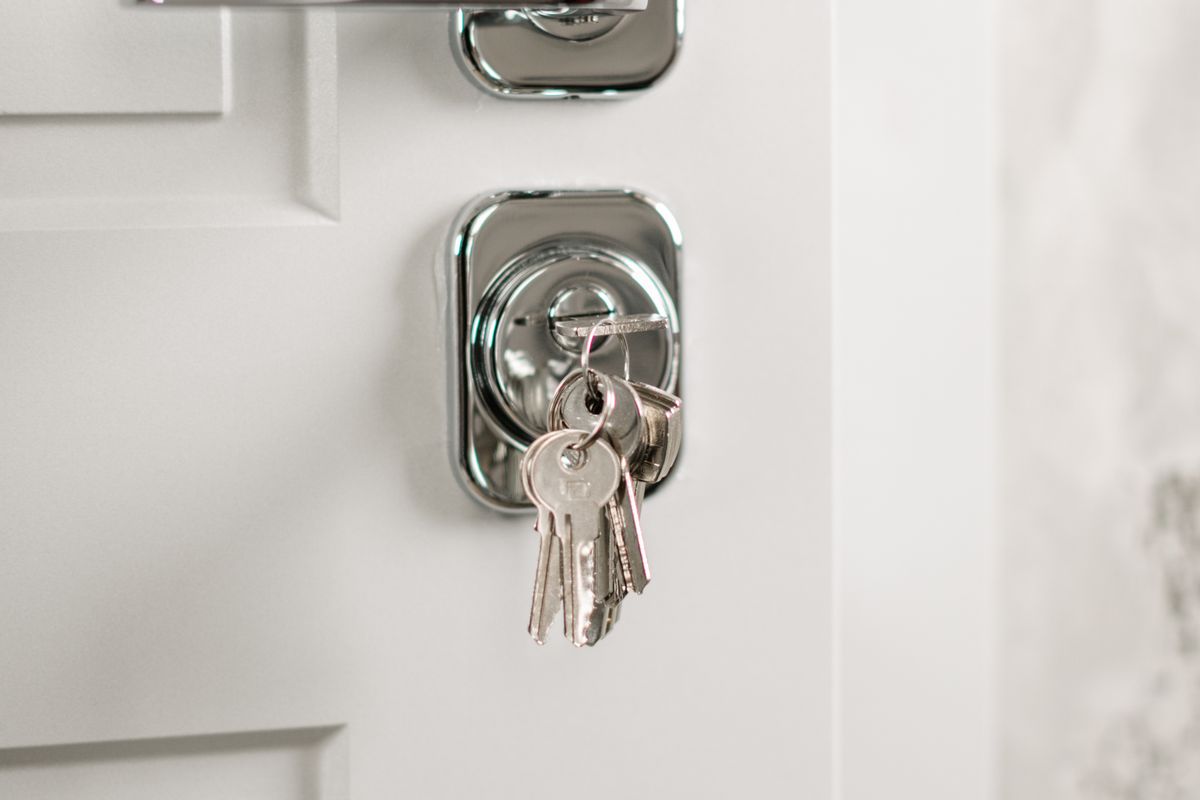 Security lock representing the safety and security of a guaranteed rent arrangement