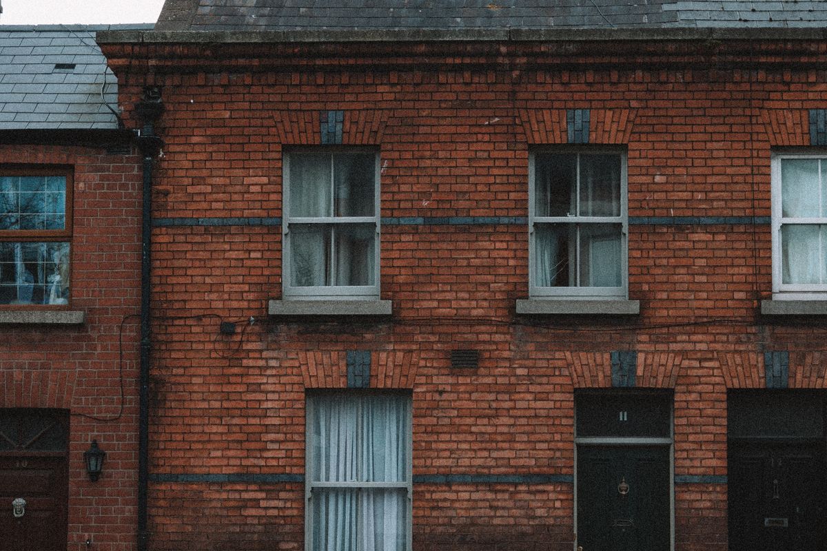 Red brick terraced housing of the kind found across Stockport and Cheadle
