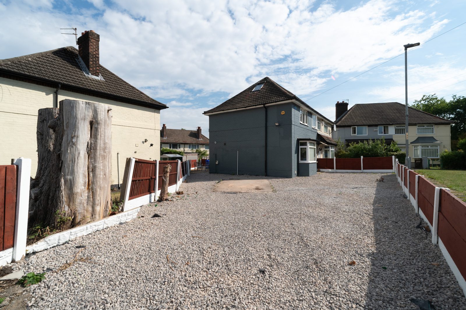 Private driveway near Manchester Airport with room for four vans or cars