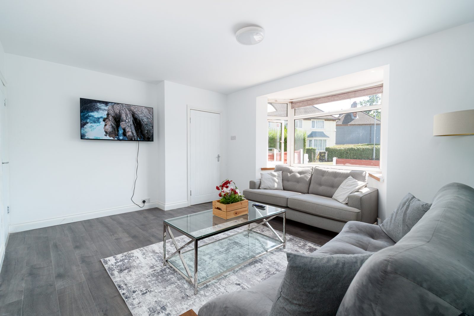 A furnished Manchester living room, the kind of detail reviewed in a guaranteed rent assessment