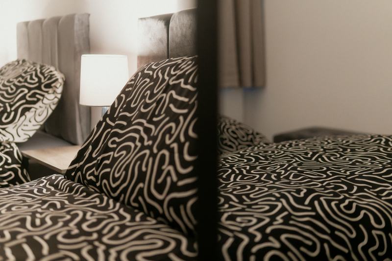Bedroom 2, beds zipped together into a queen