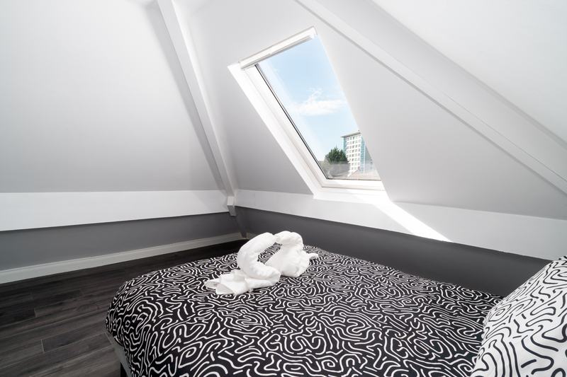 Bedroom 4, roof window and double bed