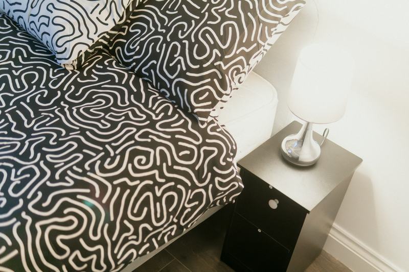Bedroom 4, bedside table and lamp