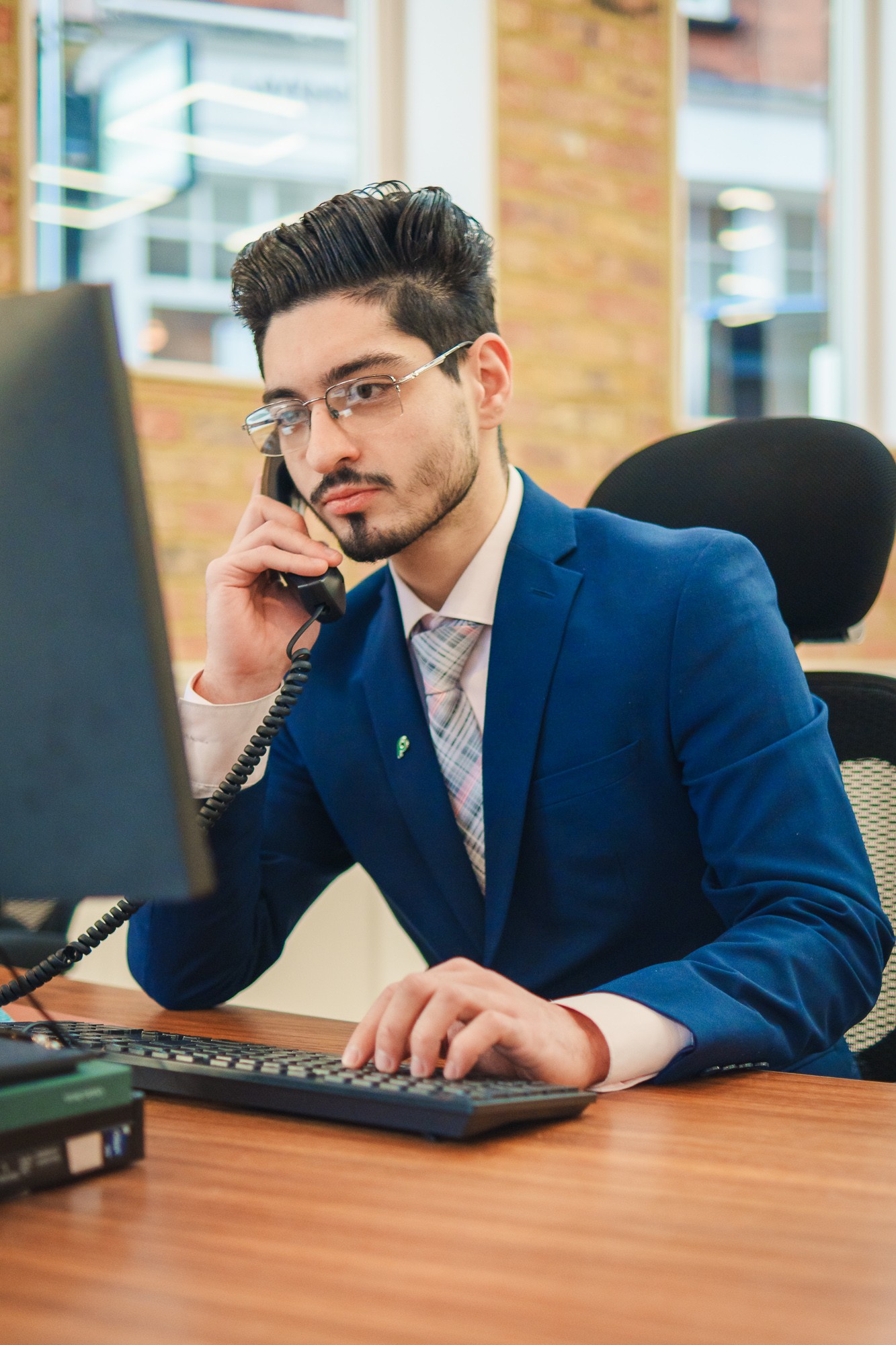 Omid Behzadnia, founder of Beacon Living Group, at his Manchester office